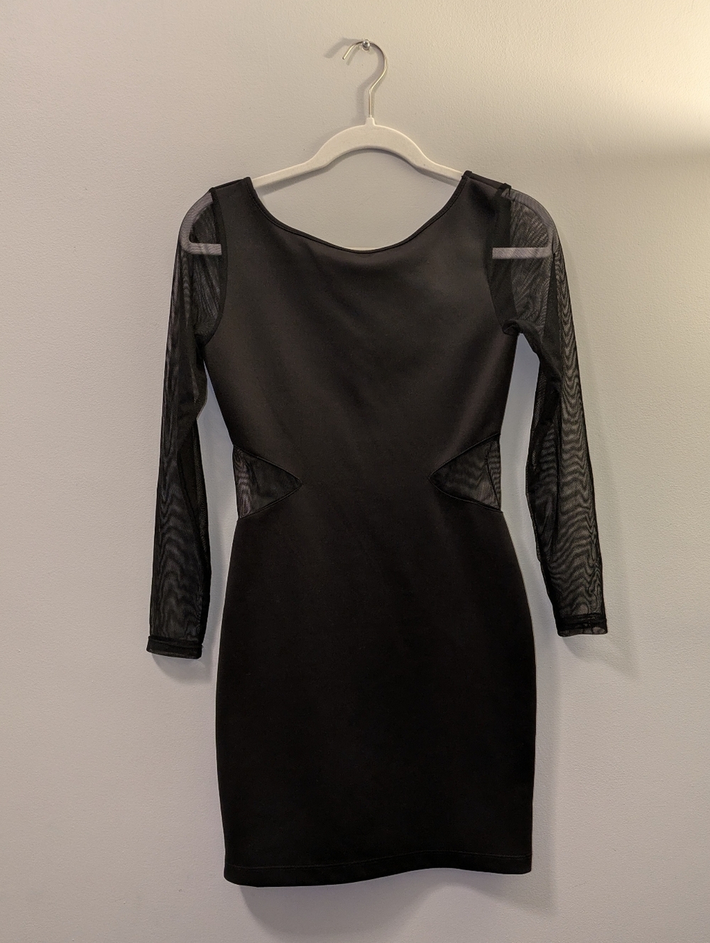 Marilyn Monroe black bodycon dress with mesh sleeves and cutouts size Small.